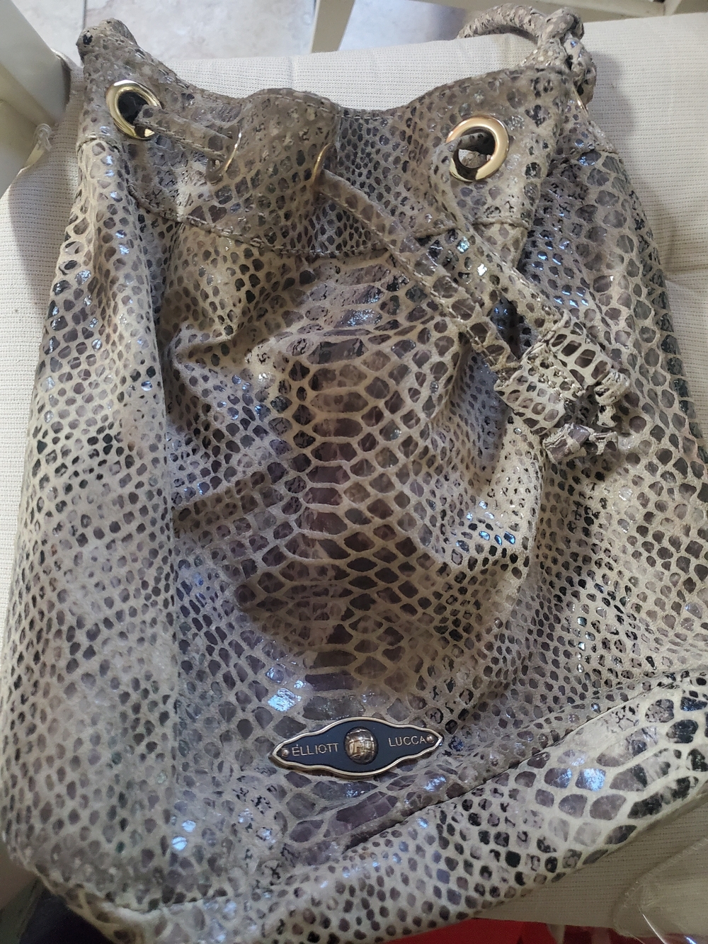 Elliott Lucca Snake-Embossed Drawstring Bucket Bag in Taupe
